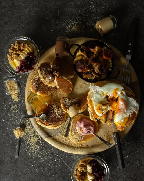 Brunch spread with coffee and pastries at Spitaki me Thea